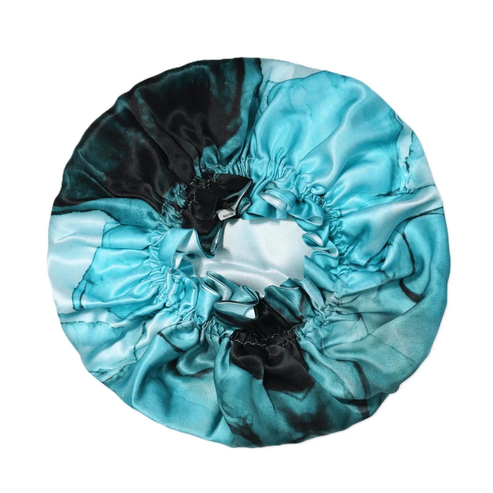 Detail view showcasing the elastic structure and unique fit of the custom silk sleep cap, tailored for optimal comfort and hair protection for beauty