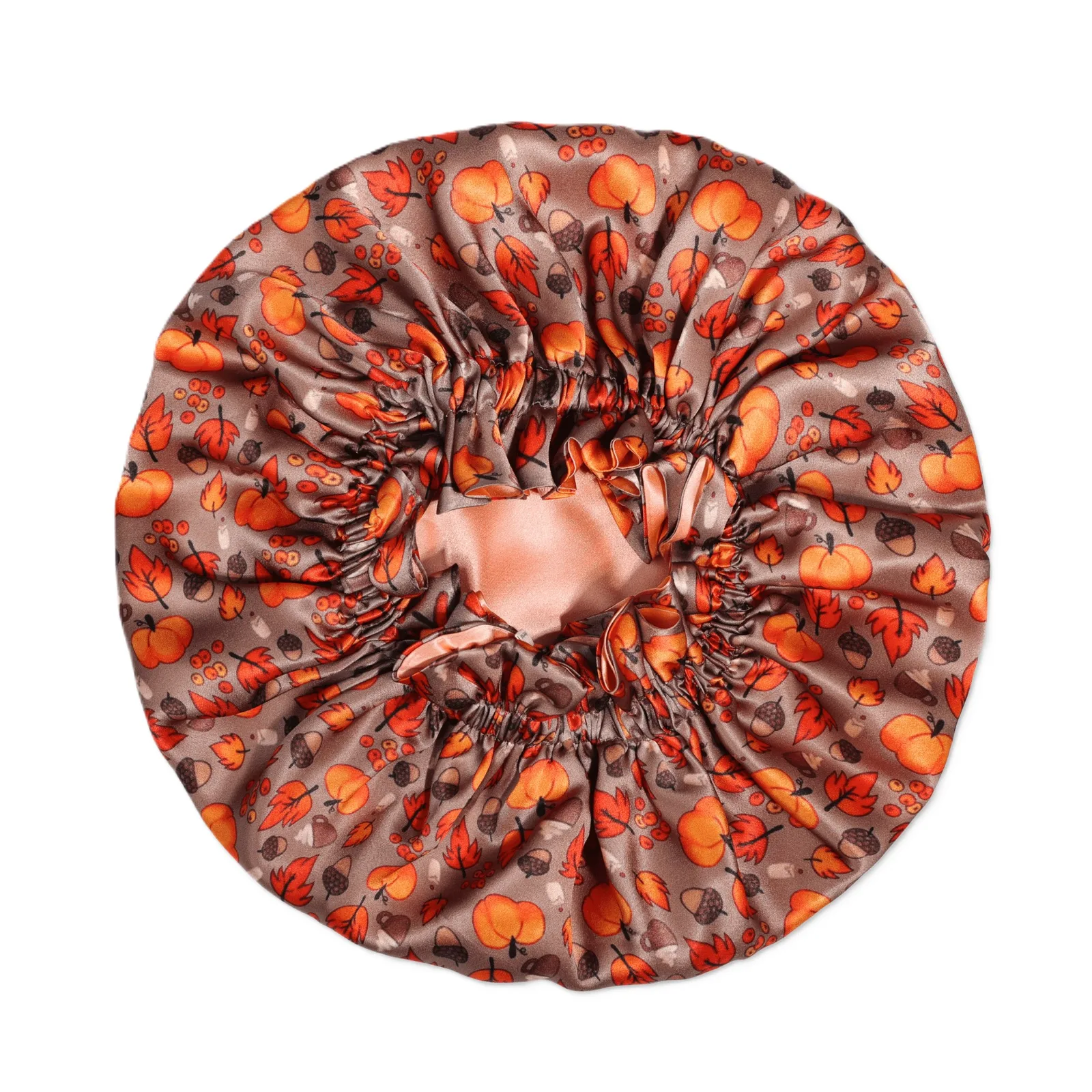Detail view of a custom silk sleep cap showcasing gathered construction and elastic fit, tailored for comfort and style in private label hair care
