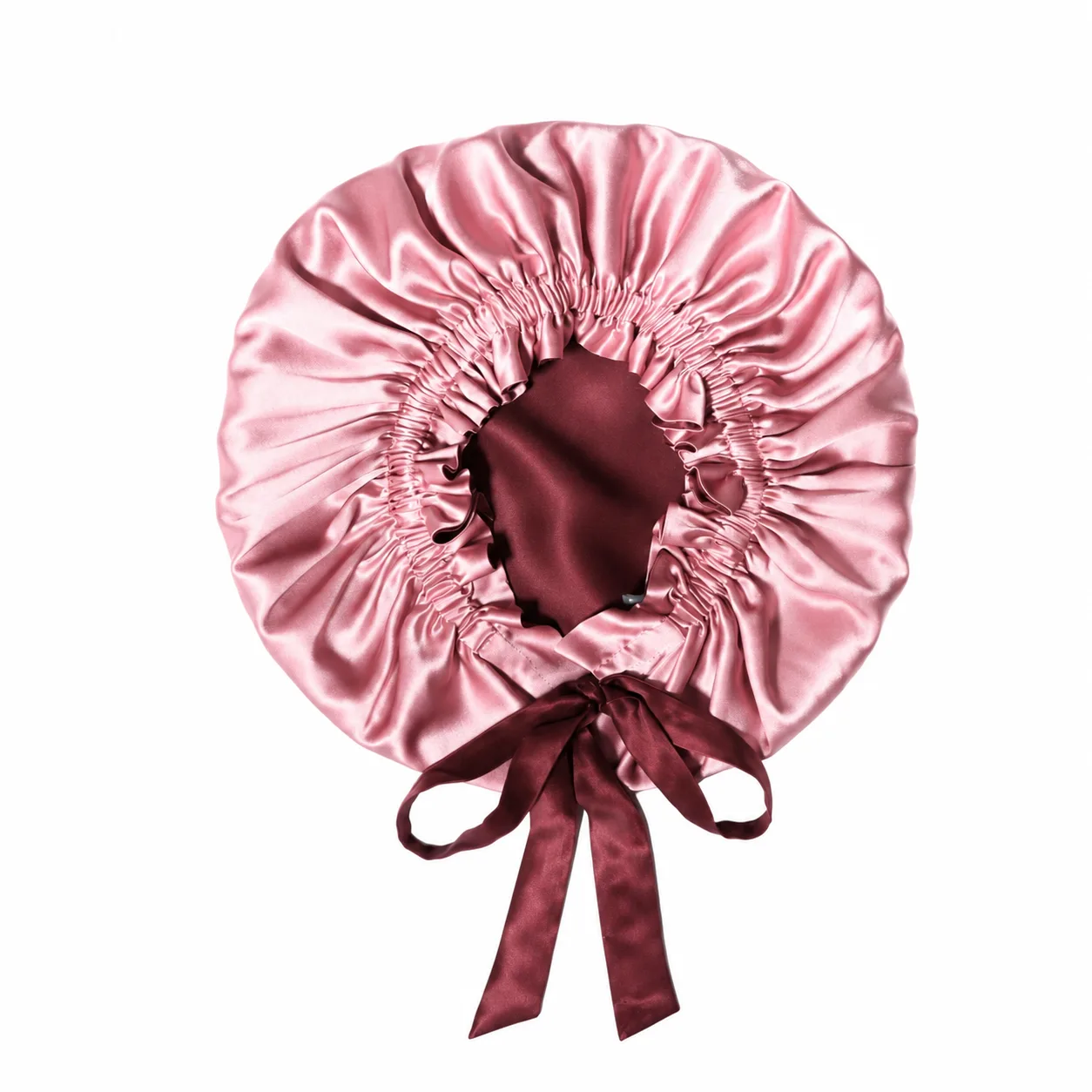Detail view of custom silk sleep cap showcasing gathered edge finish and adjustable tie for secure fit, ideal for beauty brands and hair care