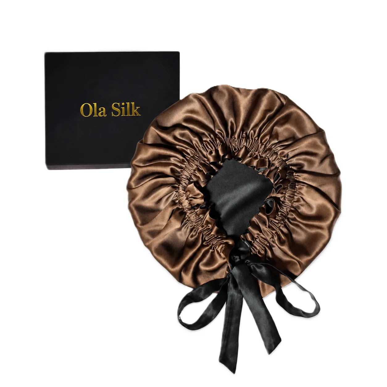 Detail view of custom silk sleep cap showcasing gathered construction and ribbon ties, designed for comfort and ease of use by private label clients