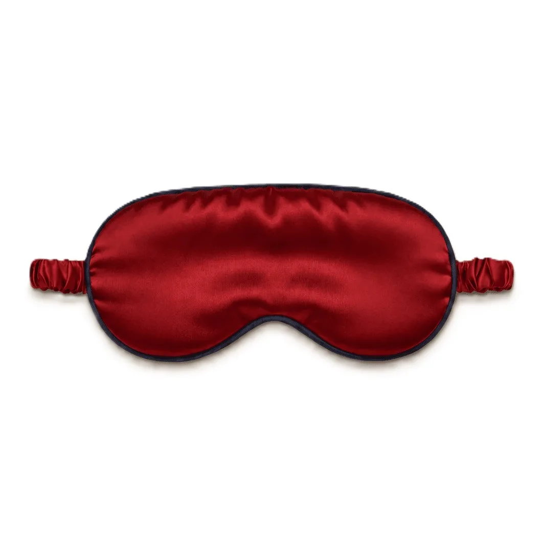 Detail view of custom silk sleep mask features a soft and contoured construction with elastic straps for a comfortable fit, ideal for private label