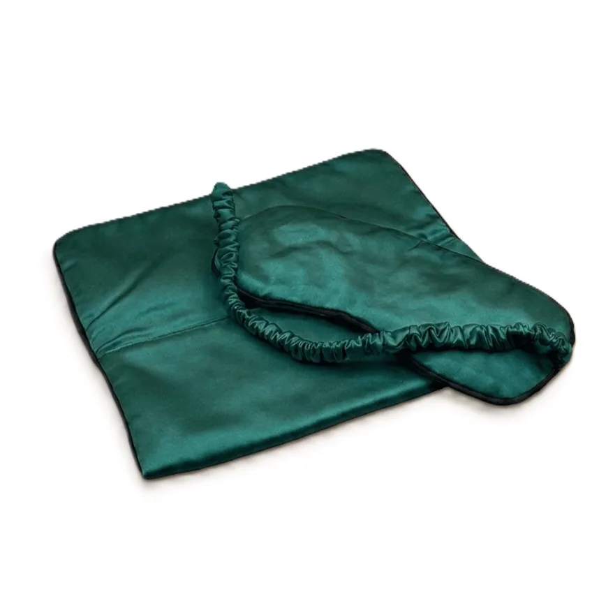 Detail view showcasing the construction and fit of a custom silk sleep mask by OlaSilk, featuring a structured design with an elastic band for comfort