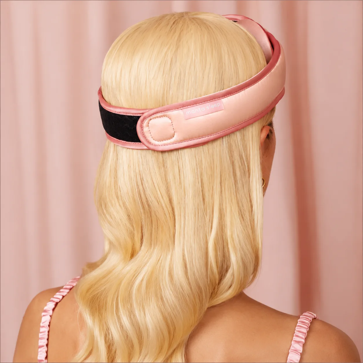 Detail view of custom silk sleep mask showing adjustable strap and construction for enhanced comfort for private label beauty, travel, and spa brands