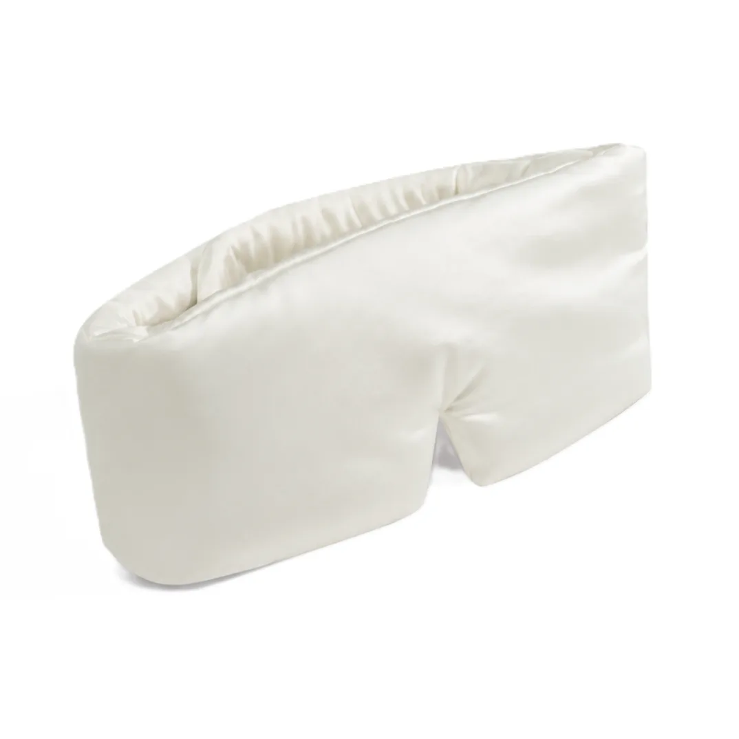 Detail view of a custom silk eye mask featuring ergonomic design with a padded structure for enhanced comfort, designed for private label clients in