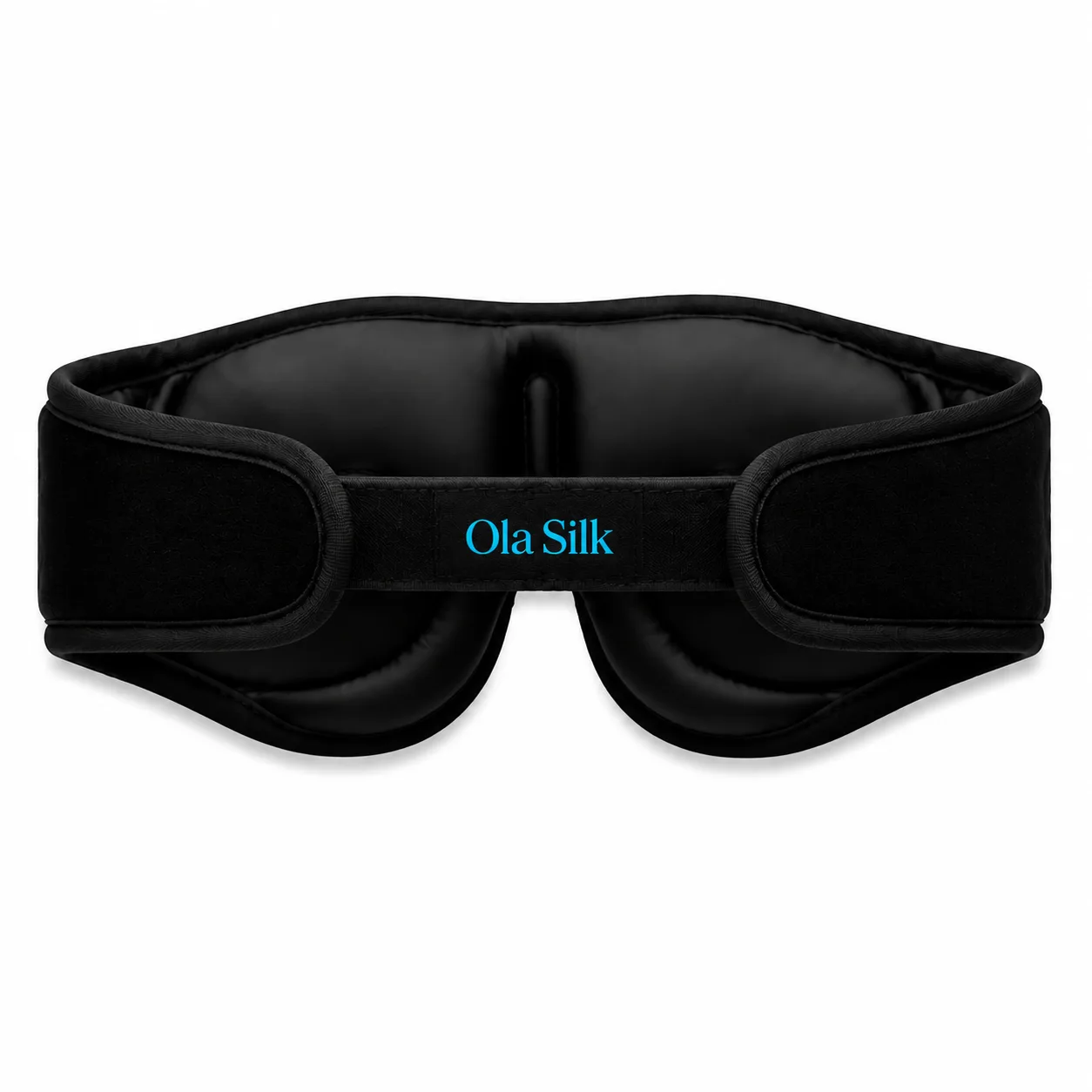 Detail view of custom silk sleep mask showcasing its structured fit and padded design for comfort, featuring a secure strap for adjustable wear