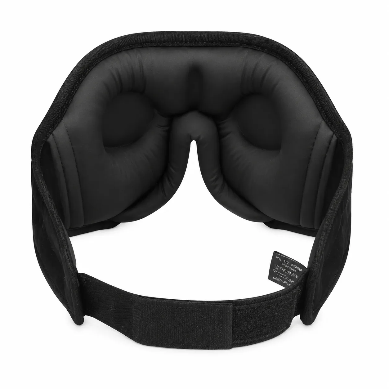 Detail view of a custom silk sleep mask featuring padded eye cushions and an adjustable strap for enhanced comfort, tailored for private label beauty