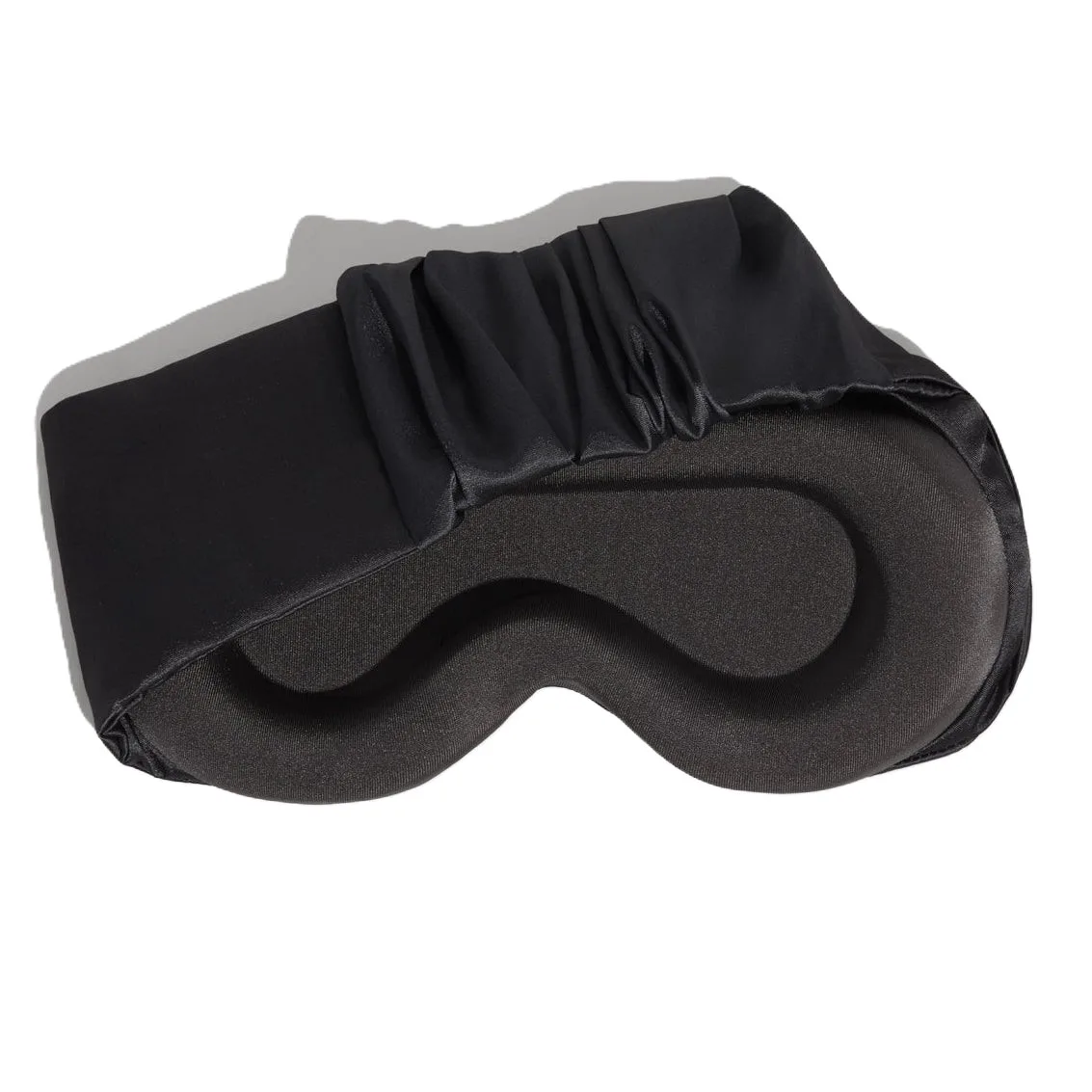 Detail view showcasing the ergonomic shape and sleek construction of a custom silk sleep mask designed for luxury comfort and effective use for beauty