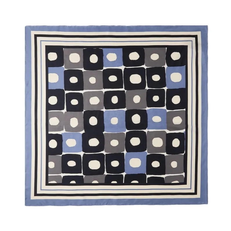 Detail view showcasing the structured design and edge finish of a custom silk scarf, ideal for private label fashion and gift brands