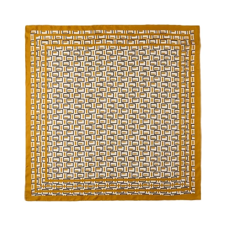 Detail view showcasing the square structure and meticulous edge finish of a custom silk scarf, highlighting its premium construction and suitability