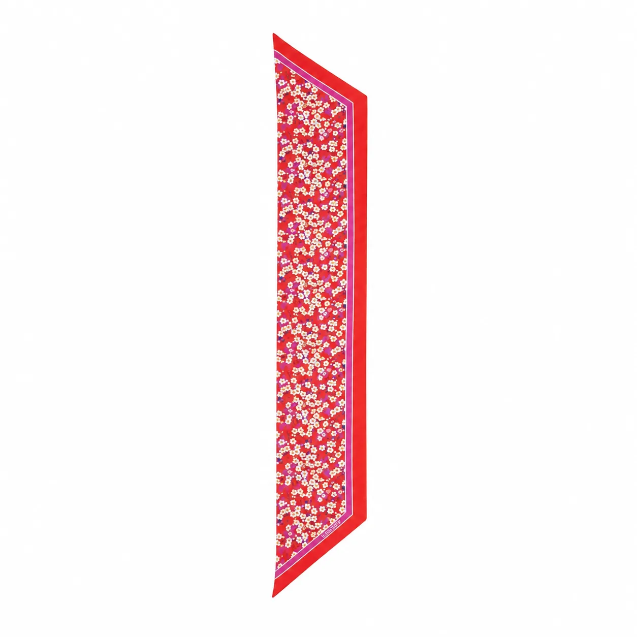 Detail view of a custom silk scarf highlighting its sharp edges and vibrant floral pattern, designed for private label brands