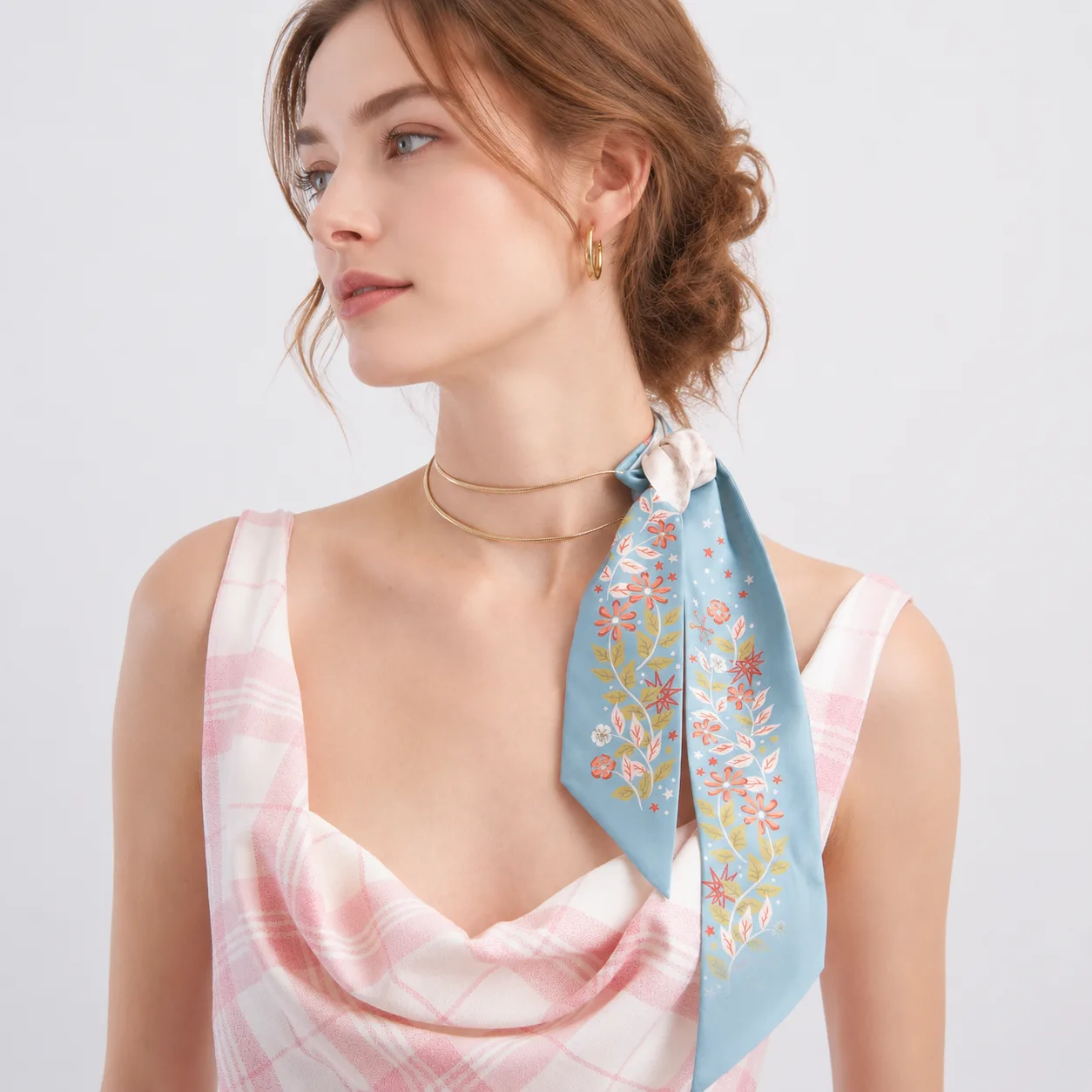 Detailed view of a custom silk scarf from OlaSilk for brand customization projects, showcasing its elegant design and secure knot structure for