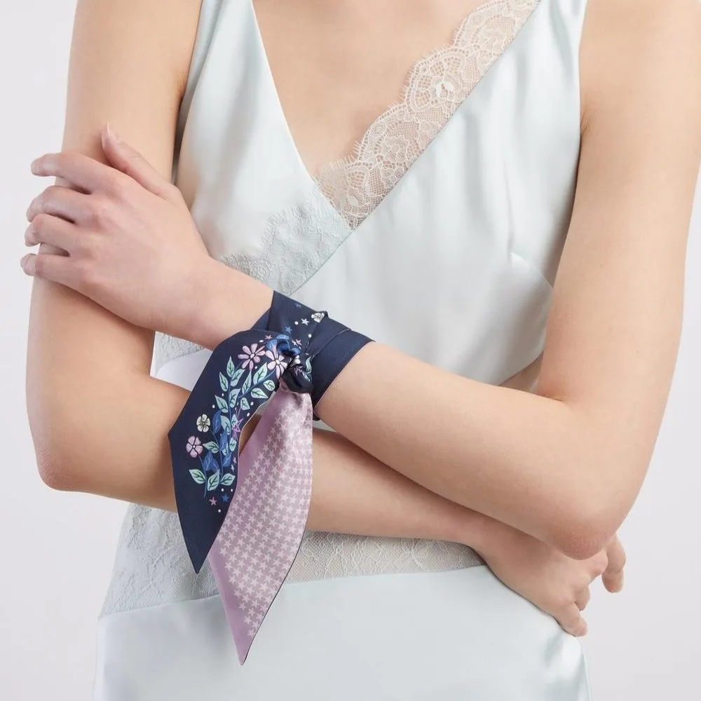 Detail view of a custom silk ribbonette designed for private label brands, showcasing its shape and construction, ideal for comfort and stylish wear