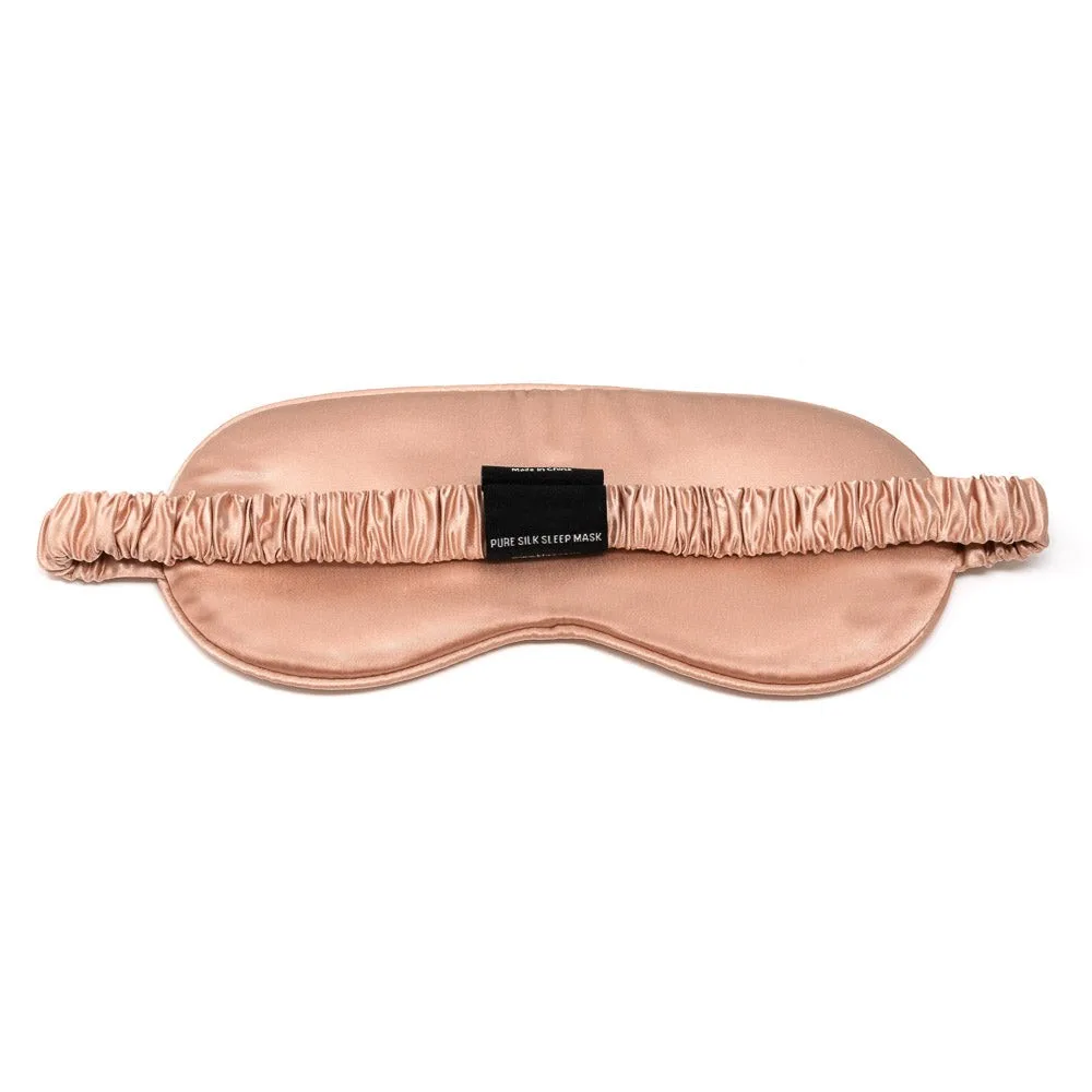 Detail view showcasing the ergonomic design and elasticized band of a custom silk sleep mask, emphasizing comfort and fit for private label clients