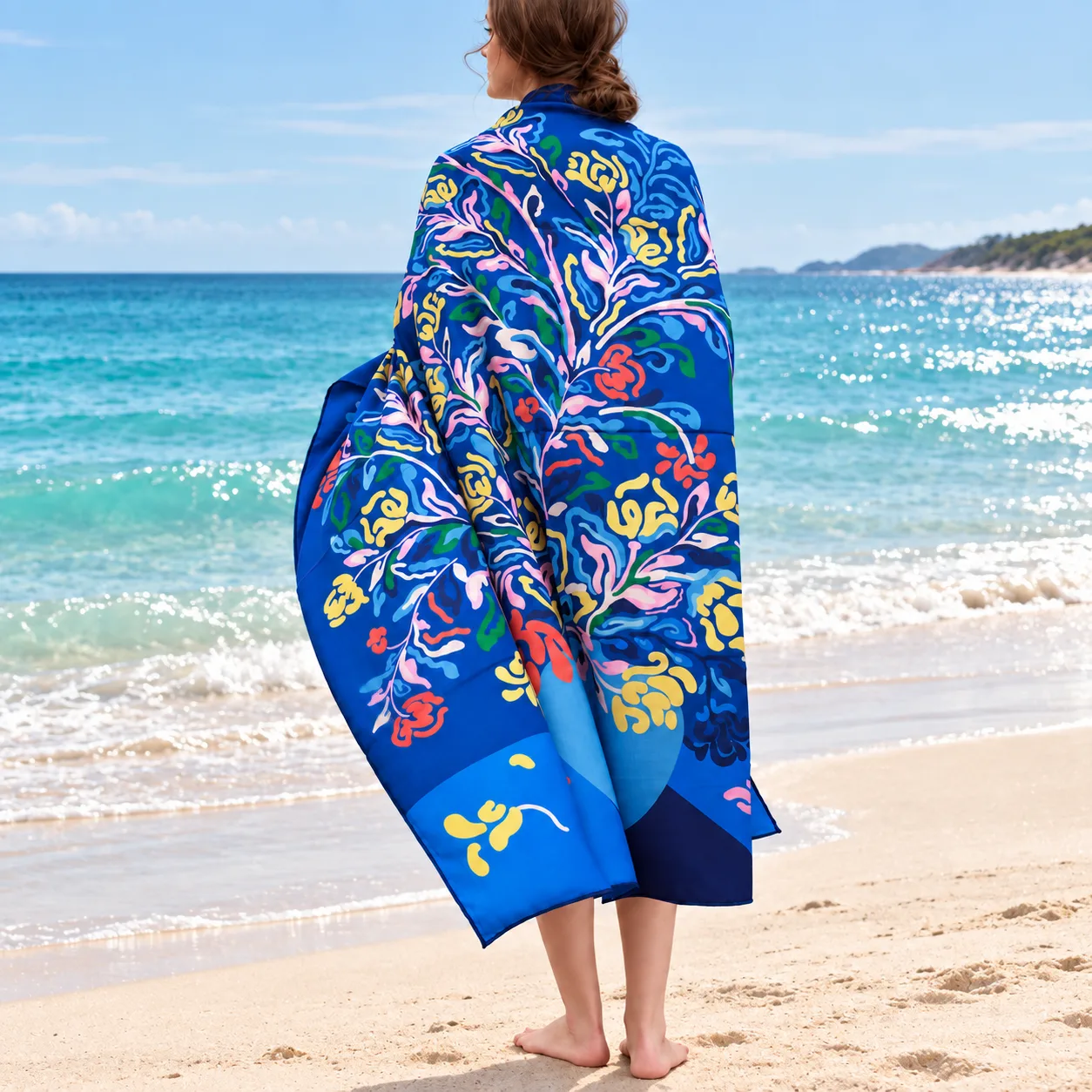 Detail view of a custom silk scarf showcasing vibrant floral patterns, featuring a structured design and smooth edges ideal for private label fashion