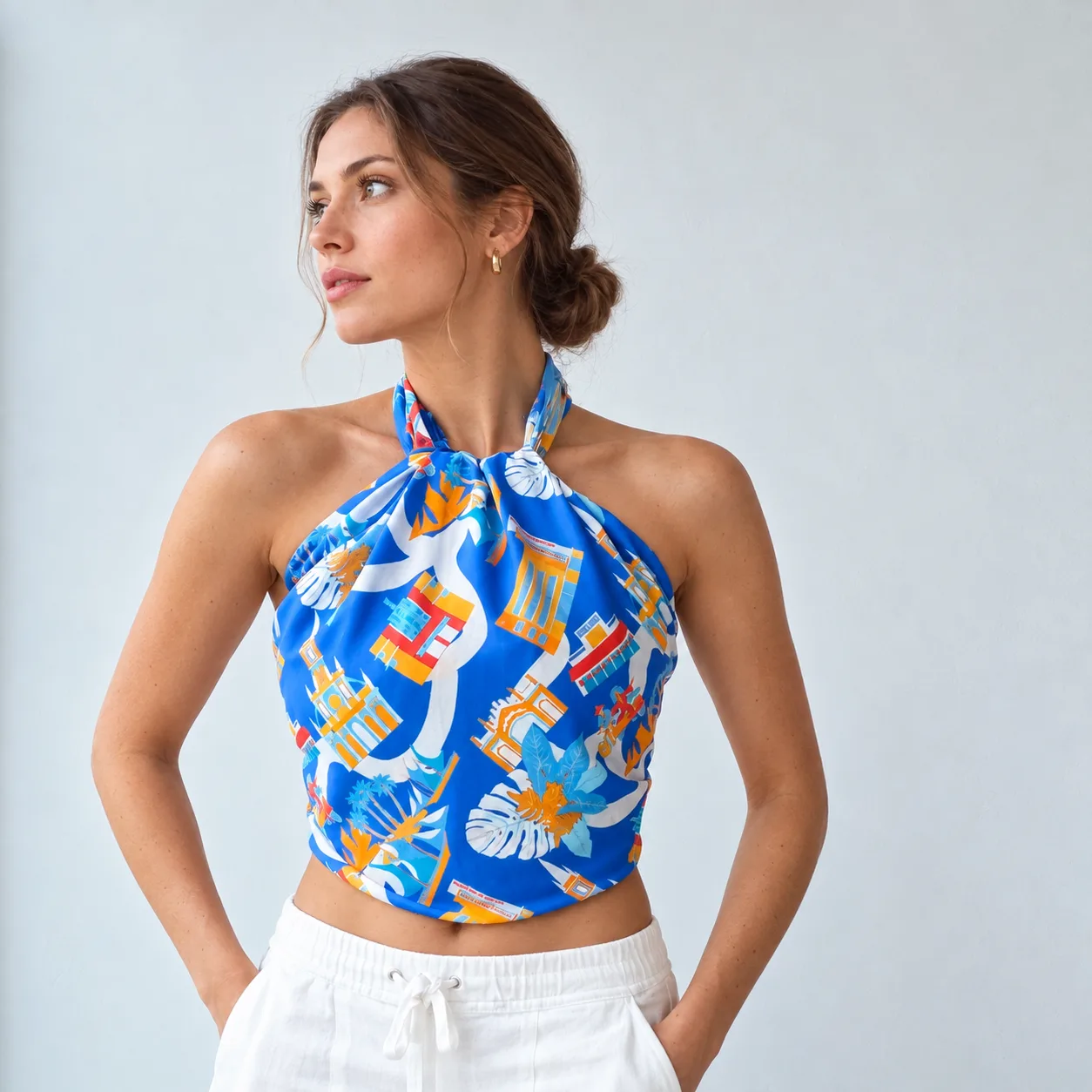 Detail view showcasing the custom silk construction with a halter neck design, featuring a secure knot and fitted bodice for comfortable wear tailored