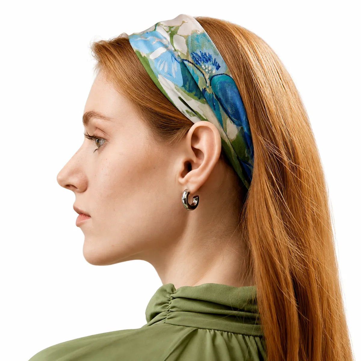 Private label floral square silk scarf styled as a hair bandana on model, showing print placement and color direction for custom silk scarf programs
